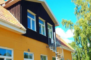 Apartment in old school, ideal for groups and families. long stay possibilities Gårdsjö